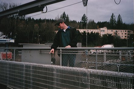 Cliff standing on cage